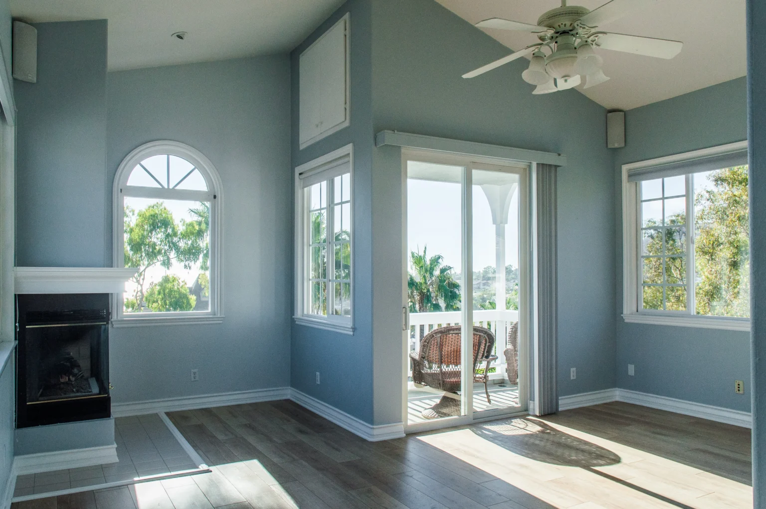 trendy-modern-interior-living-room-with-blue-walls-white-windows